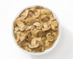 Button mushrooms with oil, garlic and parsley under aseptic technology